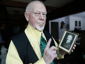 Hockey legend Don Cherry with photos of his grandfather Richard Palamountain who was in WWI and at Vimy on Monday March 13, 2017. (Michael Peake/Toronto Sun)