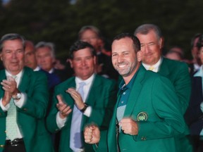 Sergio Garcia, of Spain, celebrates at the green jacket ceremony after the Masters golf tournament Sunday, April 9, 2017, in Augusta, Ga. (THE ASSOCIATED PRESS/PHOTO)