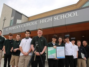 Students with St. Patrick's Catholic High School have launched Eye Wasn't There, an online video project to showcase Lambton County history. The project is being spearheaded by the Grade 11 communications technology class. Pictured here are students Sean Frost, Christian Hamilton, Austin Cormier, Ian Linton, Levi McKinlay, Ben Whyte, Kay-lynn Saunders, Robert Chow, Carter Charlton and Robbie Mitchell, with teacher Robert Walicki. (Barbara Simpson/Sarnia Observer/Postmedia Network)