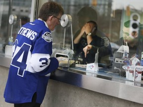 Kevin Armada buys a Blue Jays ticket on April 10, 2017. (VERONICA HENRI, Toronto Sun)