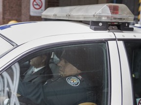 Const. Tash Baiati, along with his lawyer Peter Thorning, is pictured while leaving Toronto Police Service Headquarters on Feb. 22, 2017. (ERNEST DOROSZUK, Toronto Sun)