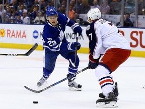 William Nylander of the Toronto Maple Leafs shoots past Jack Johnson of the Columbus Blue Jackets during NHL action at the Air Canada Centre in Toronto on April 9, 2017. (Dave Abel/Toronto Sun/Postmedia Network)