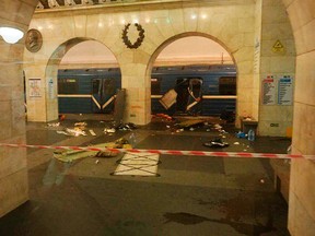 A subway train hit by a explosion stays at the Tekhnologichesky Institut subway station in St.Petersburg, Russia, Monday, April 3, 2017. (AP Photo/www.vk.com/spb_today via AP)