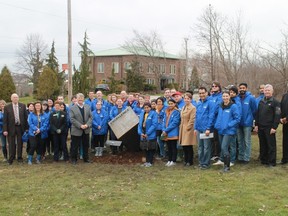 Lambton College students, staff and faculty – wearing blue – were joined by St. Clair Township Mayor Steve Arnold, township councillors and township staff at Mooretown Centennial Park for the unveiling of Lambton College's Legacy Project on Wednesday, April 5th. 
CARL HNATYSHYN/SARNIA THIS WEEK