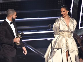 Drake presents Rihanna with the The Video Vanguard Award during the 2016 MTV Video Music Awards at Madison Square Garden on August 28, 2016 in New York City. (Photo by Michael Loccisano/Getty Images)