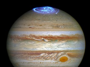 On Tuesday, April 11, 2017, scientists reported a "Great Cold Spot" in the thermospehere of the planet. And unlike the giant planet’s familiar Great Red Spot, this neOn Tuesday, April 11, 2017, scientists reported a "Great Cold Spot" in the thermospehere of the planet. And unlike the giant planet’s familiar Great Red Spot, this newly discovered weather system is continually changing in shape and size. It's formed by the energy from Jupiter's polar auroras. (NASA/ESA/Hubble via AP)wly discovered weather system is continually changing in shape and size. It's formed by the energy from Jupiter's polar auroras. (NASA/ESA/Hubble via AP)