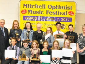 Winning major awards at the 71st annual Optimist Club of Mitchell Music Festival, presented by Mayor Walter McKenzie (back row, left) and Pat Taylor (back row, right), chair of the West Perth Sesquicentennial Committee, were Hannah Burgsma, Josie Nicholson, Jaime Shaw, Alivia Judge, Aaron Olsen and Ellyse Delaney. Front row (left): Cy Bergsma, Hayden Nicholson, Erin Prouty, Julia Havenga, Katherine Havenga and Gwenyth McKay. ANDY BADER/MITCHELL ADVOCATE