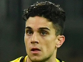 This file photo taken on April 8, 2017 shows Dortmund's Spanish defender Marc Bartra during the German first division Bundesliga football match FC Bayern Munich vs. BVB Borussia Dortmund in Munich, southern Germany. (AFP PHOTO)
