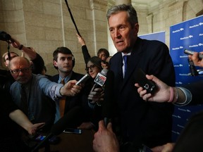 Manitoba Premier Brian Pallister speaks to media after the provincial budget speech in the Manitoba Legislature in Winnipeg, Tuesday, April 11, 2017. JOHN WOODS/The Canadian Press