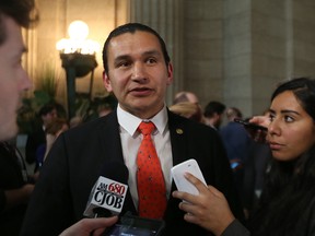 NDP MLA Wab Kinew reacts to the provincial budget in the Manitoba Legislative Building on Tues., April 11, 2017. Kevin King/Winnipeg Sun
