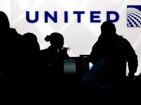 United shares fell in Tuesday morning trades, wiping out about $600 million — and the Internet slags and mock slogans were non-stop.
