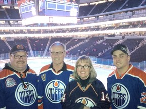 From left: Jared Snyder, with his dad Paul, mom Leslie and brother Ryan at the Edmonton Oilers vs. Calgary Flames game at Rogers Place on January 14, 2017.