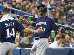 Brewers’ Keon Broxton celebrates after hitting his first-inning home run last night against the Jays. (MICHAEL PEAKE/Toronto Sun)