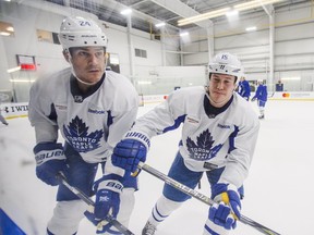 Fourth-line forwards Matt Martin (right) and Brian Boyle take part in a drill during the Maple Leafs’ workout at the MasterCard Centre yesterday. (Ernest Doroszuk/Toronto Sun)