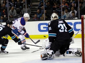 Edmonton Oilers' Mark Letestu takes a shot against San Jose Sharks goalie Martin Jones in San Jose, Calif., on April 6, 2017. (AP Photo)