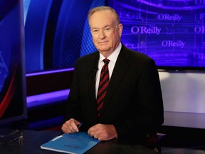 In this Oct. 1, 2015 file photo, host Bill O'Reilly of "The O'Reilly Factor" on the Fox News Channel, poses for photos in the set in New York.