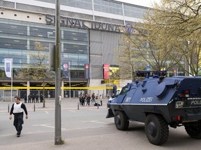 An armoured police vehicle stands in front of the stadium prior to the Champions League match between Borussia Dortmund and AS Monaco in Dortmund, Germany, Wednesday, April 12, 2017. (Guido Kirchner/dpa via AP)