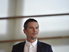 U.S actor Ethan Hawke poses during a photo call before receiving a Donostia Award for his contribution to the cinema at the San Sebastian Film Festival, in San Sebastian, northern Spain, Saturday, Sept. 17, 2016. Hawke knows well the rugged, salty landscape of Nova Scotia.The four-time Oscar-nominated actor and scribe says he bought a place near Guysborough, N.S., 18 years ago after doing writing retreats at a friend's cabin in Cape Breton. He and his family now have friends there and try to go for about a month every summer. THE CANADIAN PRESS/AP/Alvaro Barrientos