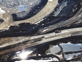 An aerial view Suncor's Millennium Mine oilsands operation north of Fort McMurray, Alta. on June 18, 2013. Ryan Jackson/Edmonton Journal/Postmedia Network