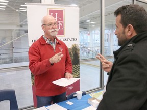 BRUCE BELL/THE INTELLIGENCER
Hillier Creek Estates owner Kemp Stewart interviews Abrahin Al Khalaf, a prospective employee, at the job fair held for Syrian refugees at the Quinte Sports and Wellness Centre on Wednesday morning.