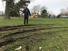 City of Sarnia Parks and Recreation Director Rob Harwood gestures to vandalism at Mike Weir Park in Bright's Grove. It's one of two city parks  damaged by vehicle tires last weekend. (Submitted)