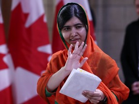Pakistani Nobel Peace Laureate Malala Yousafzai leaves Parliament hill after receiving an honorary Canadian citizenship in Ottawa, Ontario, April 12, 2017. (GETTY IMAGES)