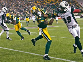 Edmonton's Joe Burnett challenges Ottawa's Paris Jackson during a CFL game at Commonwealth Stadium in Edmonton on July 11, 2014. (Codie McLachlan/Edmonton Sun)