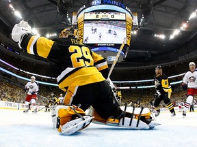 Marc-Andre Fleury #29 of the Pittsburgh Penguins makes a first-period save while playing the Columbus Blue Jackets in Game One of the Eastern Conference First Round during the 2017 NHL Stanley Cup Playoffs at PPG Paints Arena on April 12, 2017 in Pittsburgh, Pennsylvania. Pittsburgh won the game 3-1 to take a 1-0 series lead. (Gregory Shamus/Getty Images)
