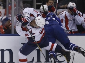 Alex Ovechkin is hit by Nazem Kadri as the Toronto Maple Leafs host the Washington Capital at the Air Canada Centre in Toronto on April 4, 2017. Michael Peake/Toronto Sun