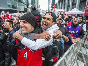Toronto Raptors fans watch the playoffs on the big screen at Maple Leaf Square on May 15, 2016. (Ernest Doroszuk/Toronto Sun)