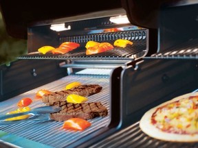 Staff at Porky?s check over grills for safe operation before customers take home their barbecues with their replacement parts installed in them.