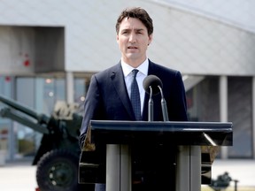Prime Minister Justin Trudeau speaks during an availability at the Juno Beach Centre in Courseulles-sur-Mer, France, on Monday, April 10, 2017. THE CANADIAN PRESS/Adrian Wyld