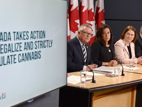 Minister of Public Safety and Emergency Preparedness Ralph Goodale, left to right, Justice Minister and Attorney General of Canada Jody Wilson-Raybould, and Health Minister Jane Philpott announce changes regarding the legalization of marijuana during a news conference in Ottawa, Thursday, April 13, 2017. THE CANADIAN PRESS/Adrian Wyld