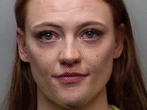 This is a Friday, April 7, 2017, booking photograph of 22-year-old Michaella Surat supplied by the Fort Collins, Colo., Police Department. Surat, a junior at Colorado State University, has been charged on suspicion of third-degree assault and obstructing a peace officer. A video spreading on social media shows a Fort Collins Police Department officer throwing Surat face-first onto a sidewalk after a scuffle. (Fort Collins, Colo., Police Department via AP)