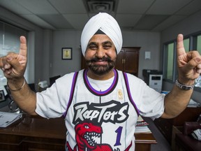 Owner of Mississauga Hyundai, Superfan Nav Bhatia poses for a photo at his dealership in Mississauga, Ont. on Thursday April 13, 2017. (Ernest Doroszuk/Toronto Sun)