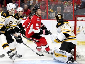 Mark Stone looks for the puck as he moves in on the Boston crease as the Ottawa Senators meet the Boston Bruins at the Canadian Tire Centre in Game 1 on April 12, 2017. (Wayne Cuddington/Postmedia)