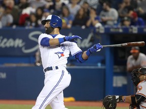 Jose Bautista of the Toronto Blue Jays hits a double in the sixth inning of his team's game against the Baltimore Orioles at Rogers Centre on April 13, 2017 (TOM SZCZERBOWSKI/Getty Images)