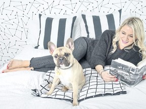 Kate Makinson relaxes with her French Bulldog ?Blondie? at their Toronto home.