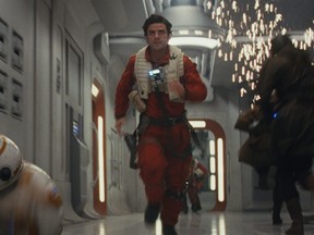 BB-8 (left) and Poe Dameron (Oscar Isaac) in "Star Wars: The Last Jedi." (Film Frames Industrial Light & Magic/Lucasfilm/Supplied)