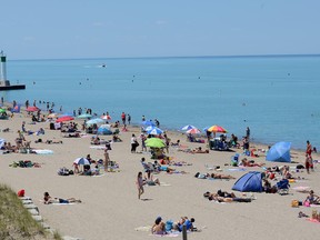 Grand Bend’s popular beach is one of only 28 to have received Blue Flag status for its commitment to strict water quality and safety. The beach is immense and actually stretches over 25 miles, a true gem in Southwestern Ontario, says travel writer Bob Boughner. File photo/Postmedia Network