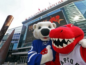Carlton the Bear and The Raptor out front of the Air Canada Centre at Maple Leaf Square in Toronto as both the Raptors and the Leafs are set to start their playoffs on Thursday April 13, 2017. (Dave Abel/Toronto Sun)