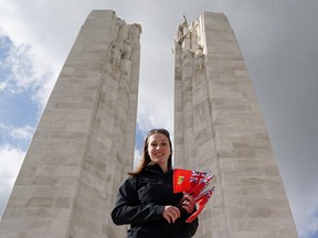 Cpl. Sarah Robertson recently took four Red Ensign flags to the Canadian National Vimy Memorial in France, in honour of four Sarnia soldiers killed because of the battle 100 years ago. She was selected to bear the flags by a relative of one of the soldiers. (Submitted, courtesy of Sgt. Matthew Sharp)