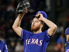 Sam Dyson of the Rangers has done nothing short of melt down in his first three appearances this season. (The Associated Press)