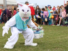 The Easter Bunny gets ready to unleash a horde of children on the chocolate-egg covered field of the Milford fairgrounds during the annual egg hunt on Saturday April 15, 2017 in Milford, Ont. Tim Miller/Belleville Intelligencer/Postmedia Network