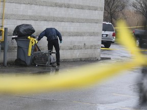 Peel Police investigate at murder outside Masta's Lounge on Orenda Rd. in Brampton on Saturday, April 15, 2017. (Veronica Henri/Toronto Sun)