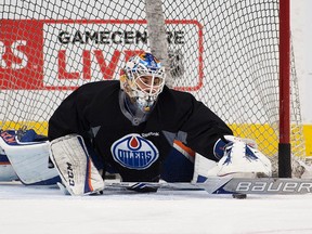 Goaltender  Cam Talbot makes a save during an Edmonton Oilers practice on Saturday April 15, 2017 in Edmonton.