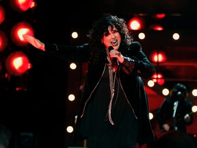 In this Dec. 3, 2010, file photo, Ann Wilson of the band Heart performs onstage at the "Vh1 Divas Salute the Troops" on in San Diego, Calif. The husband of Heart lead singer Ann Wilson has been sentenced for allegedly choking her nephews during a concert in suburban Seattle. Seattlepi.com reported Friday, April 14, 2017, that Dean Wetter pleaded guilty March 9 to two counts of assault. He was sentenced as part of a plea deal to 364 days in jail, with all the time suspended. (AP Photo/Matt Sayles, File)