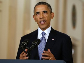 In this Sept. 10, 2013 file-pool photo, U.S. President Barack Obama blend the threat of military action with the hope of a diplomatic solution as he works to strip Syria of its chemical weapons during an address to the nation in a live televised speech from the East Room of the White House in Washington. (AP Photo/Evan Vucci, File, Pool)