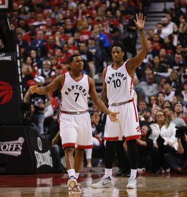 Toronto Raptors DeMar DeRozan G (10) and  Kyle Lowry G (7) complain about a call during the first half of Game 1 in Toronto, Ont. on Saturday April 15, 2017. Jack Boland/Toronto Sun/Postmedia Network