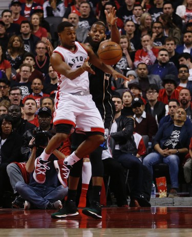 Toronto Raptors Kyle Lowry G (7) deals the ball off during the third quarter of Game 1 in Toronto, Ont. on Saturday April 15, 2017. Jack Boland/Toronto Sun/Postmedia Network